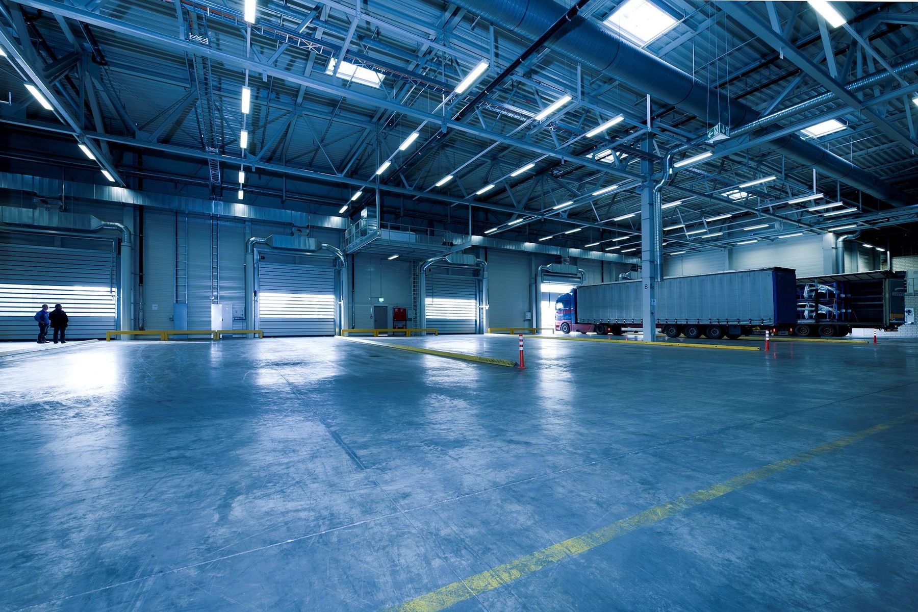 Illustrative photograph of a warehouse dock interior. Not a completed company project.