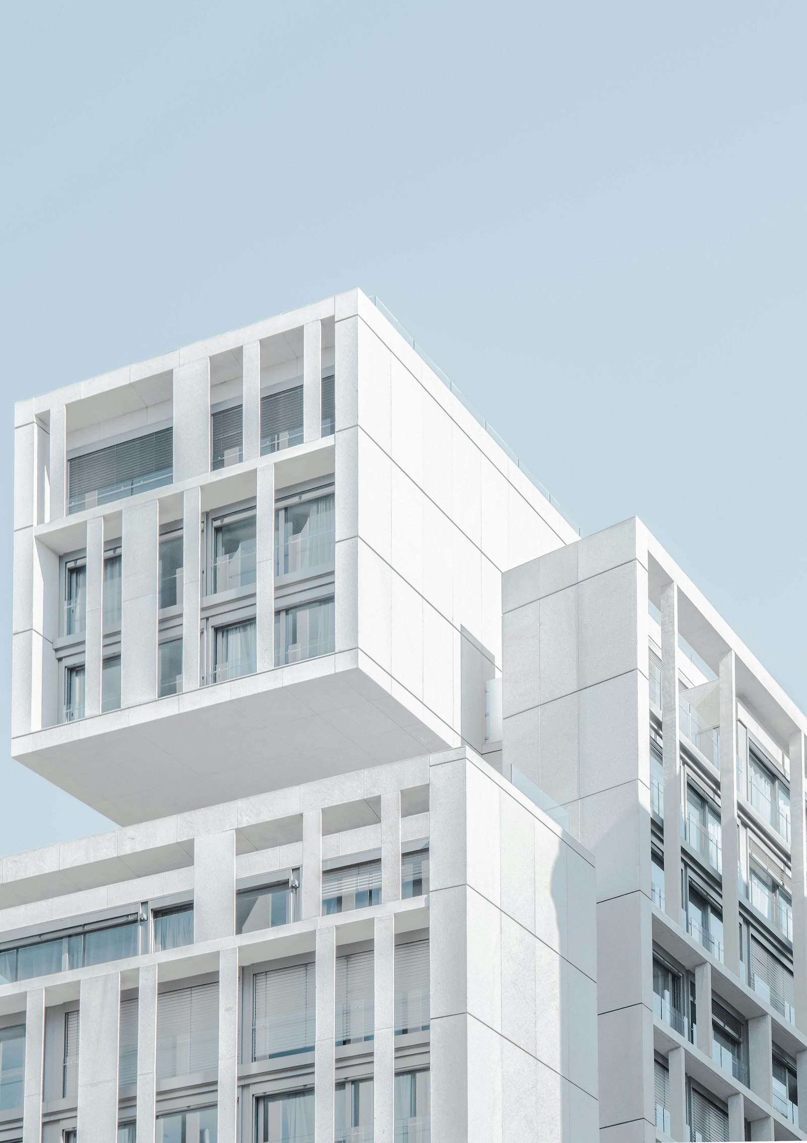 Illustrative photograph of a modern commercial building. Not a completed company project.